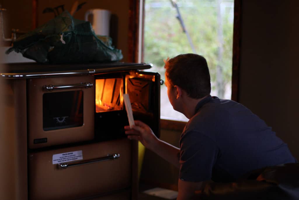 Lighting a wood burning stove