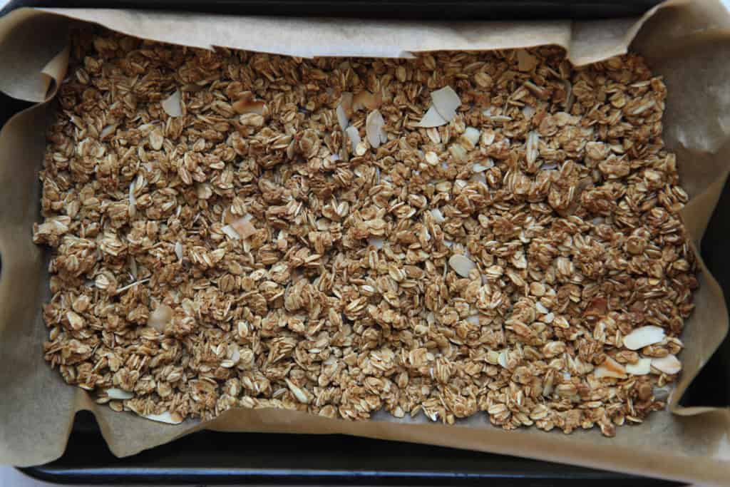 A baking tray covered with nut granola