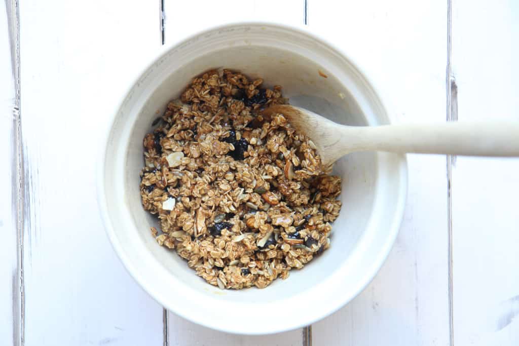 A bowl containing mixture for granola bars