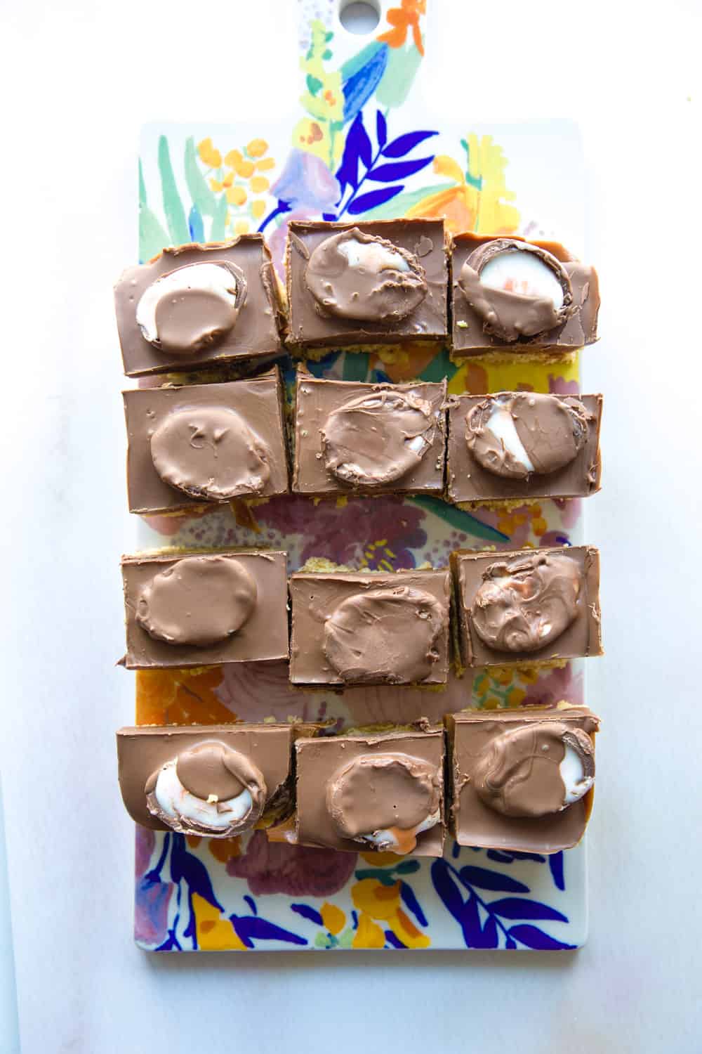 Overhead view of 12 slices of Cadbury's Creme Egg Caramel Shortbread