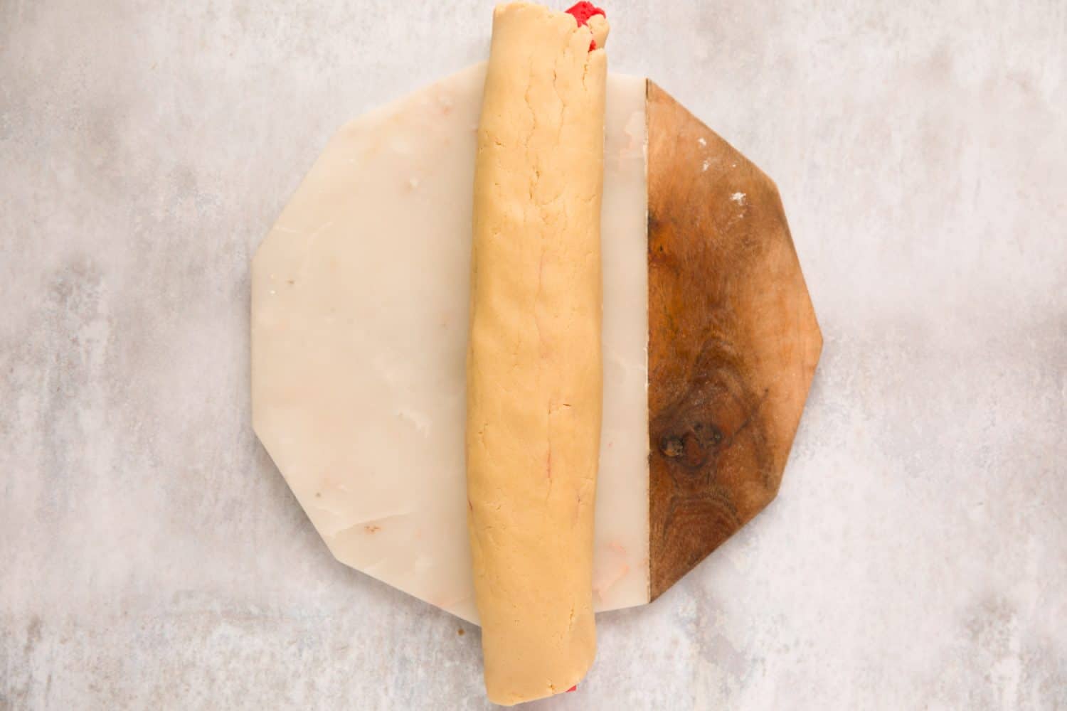 Biscuit dough that has been rolled into a sausage shape.
