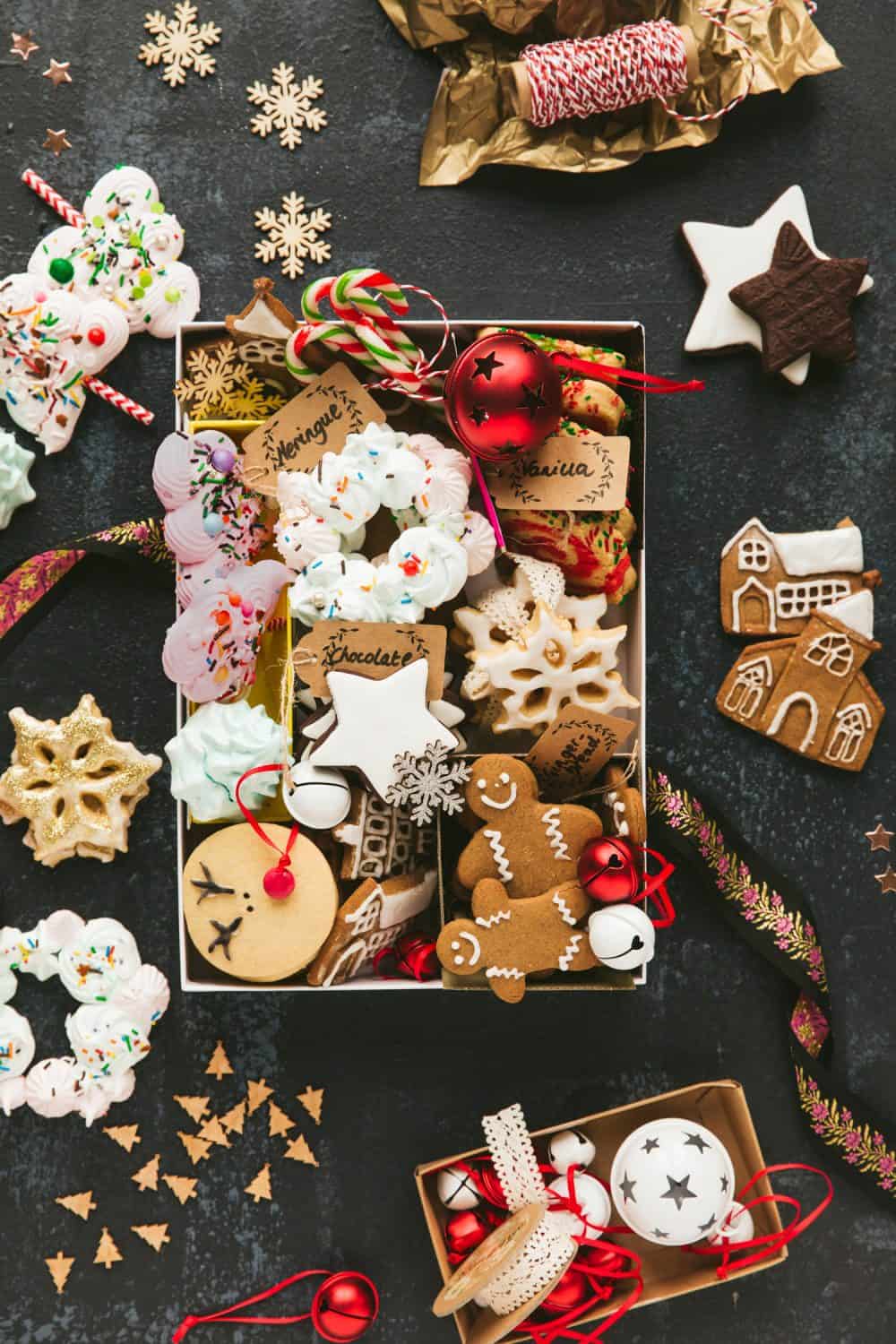 A christmas cookie gift box containing a variety of biscuits and cookies. 