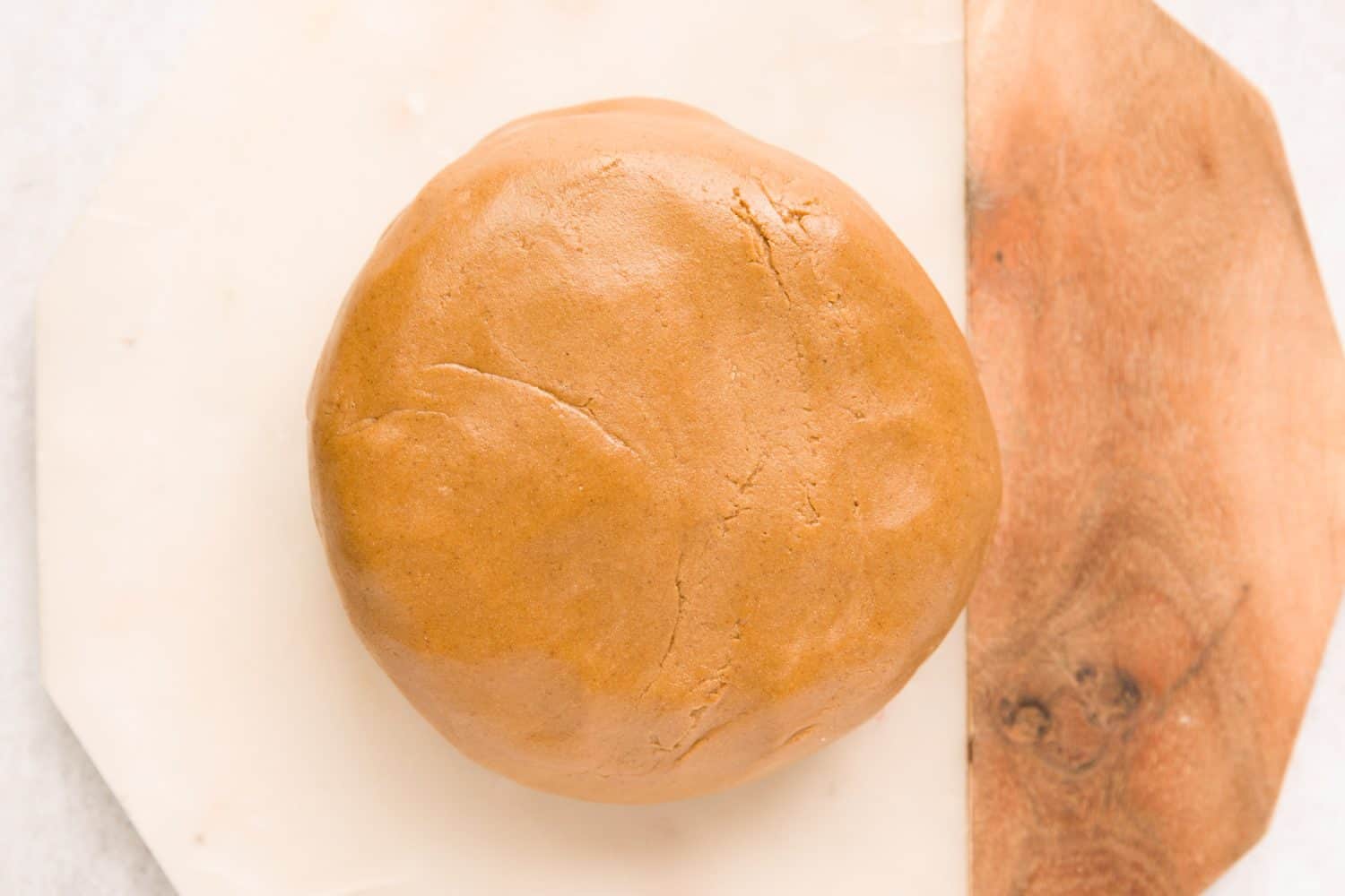 A ball of gingerbread dough.
