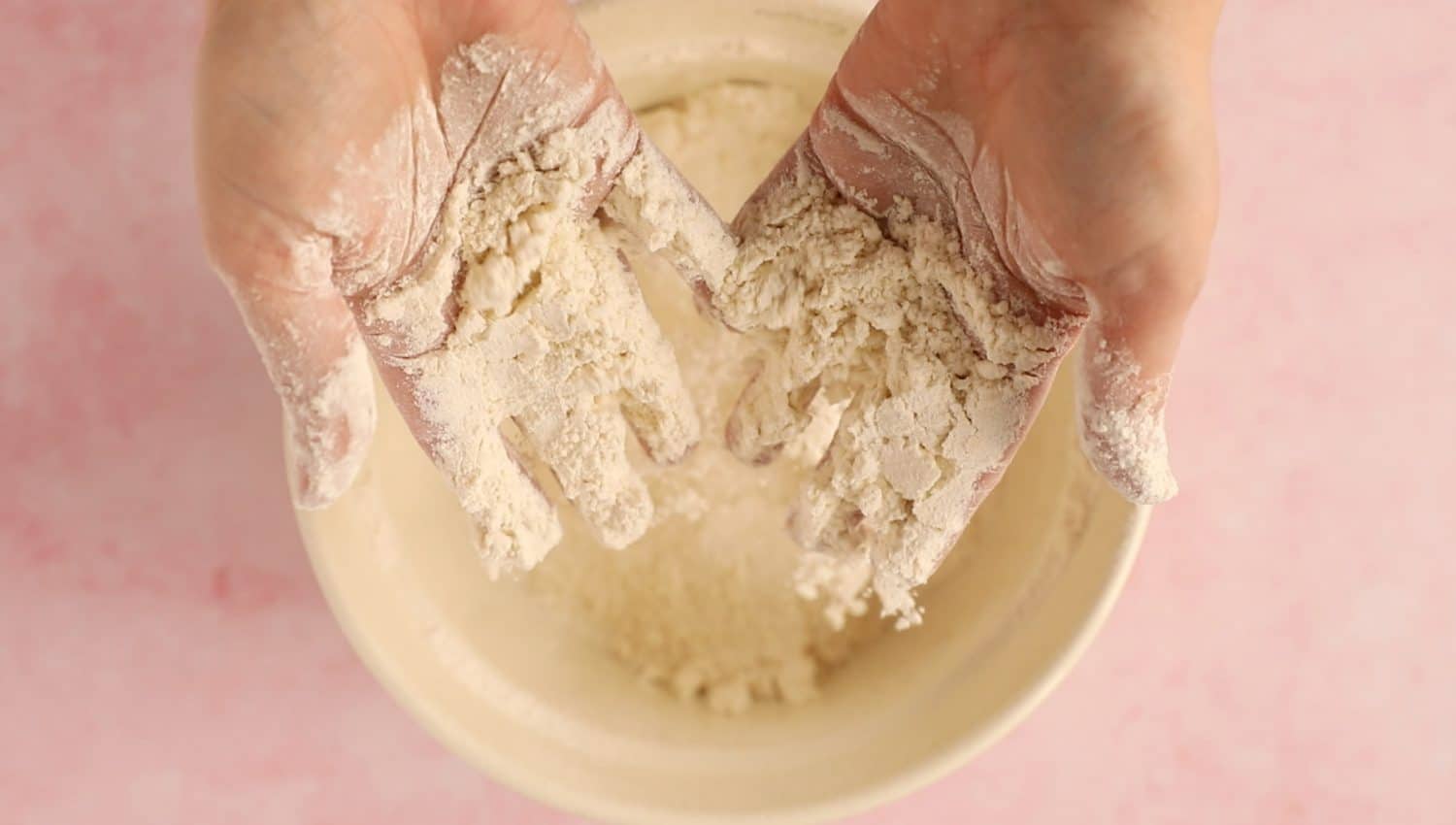 Rubbing butter into flour. 