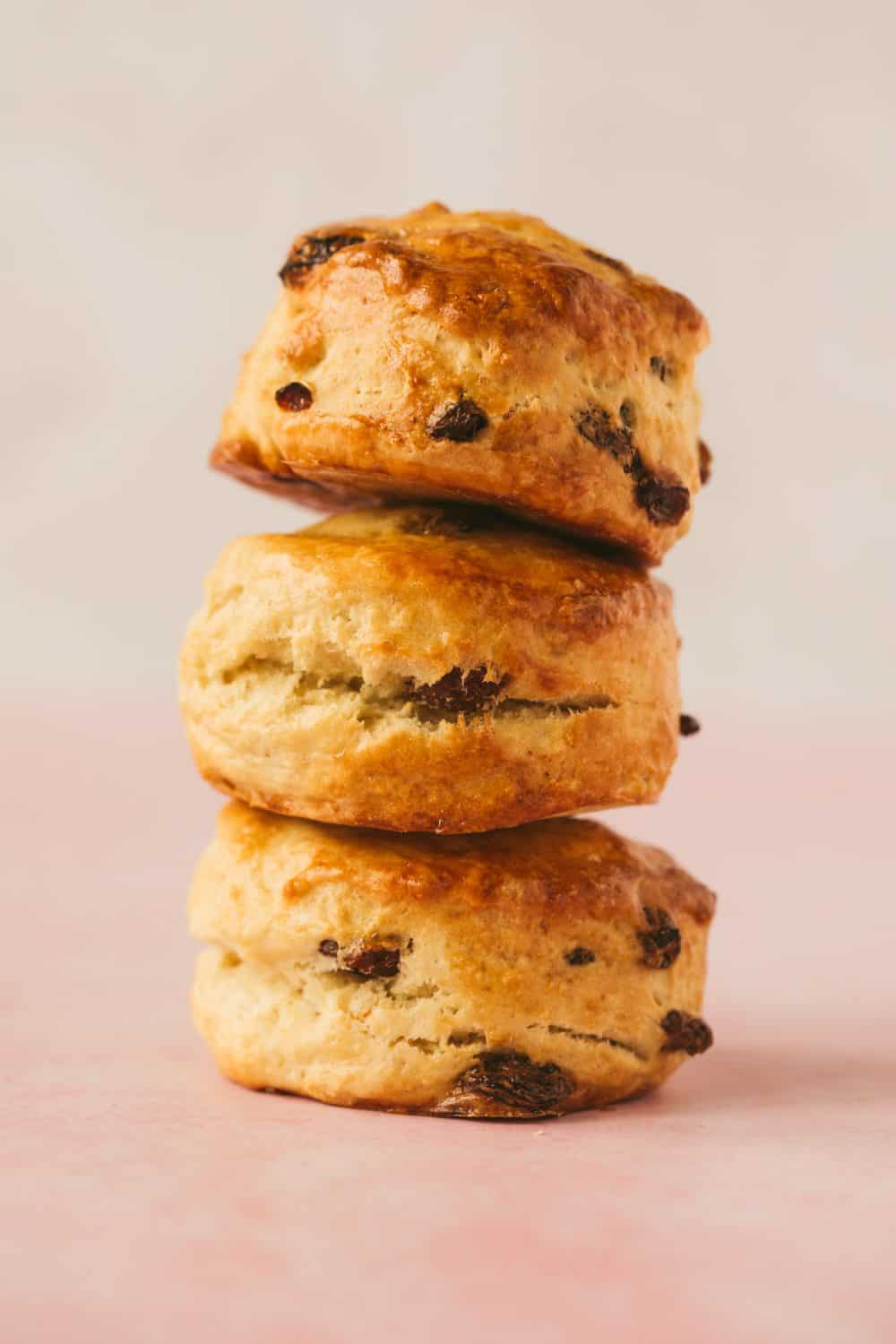 3 sultana fruit scones balanced on top of one another. 