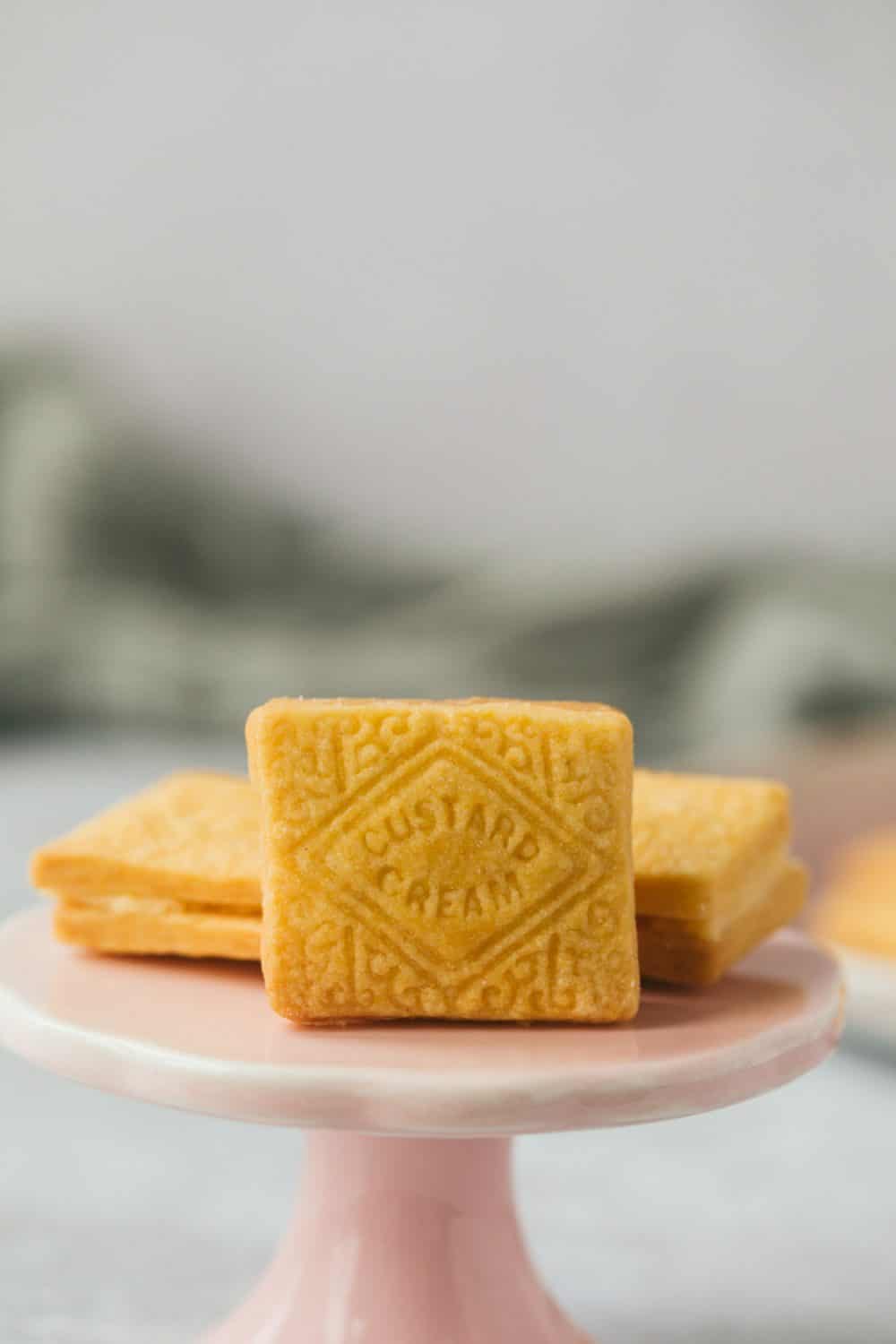 A Custard Cream biscuit on its side. 