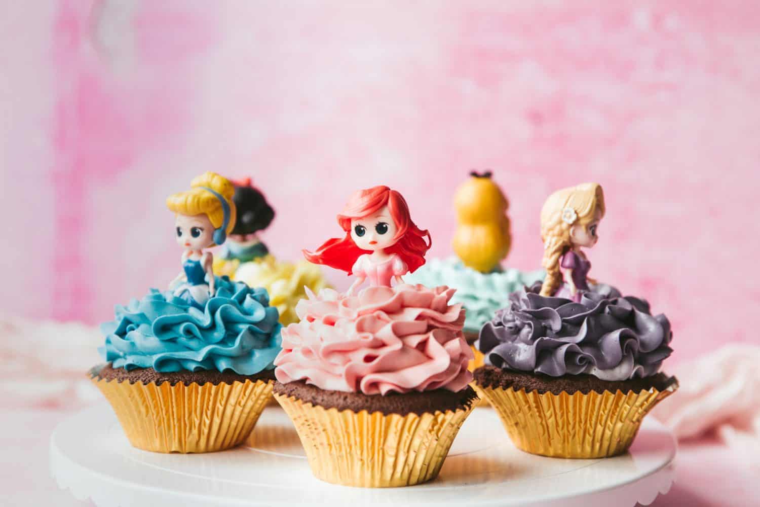 5 Disney Cupcakes with princess cupcake toppers. 