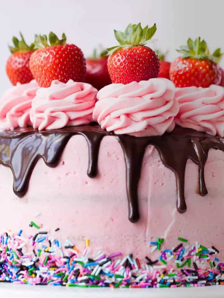 Close up of a strawberry drip cake
