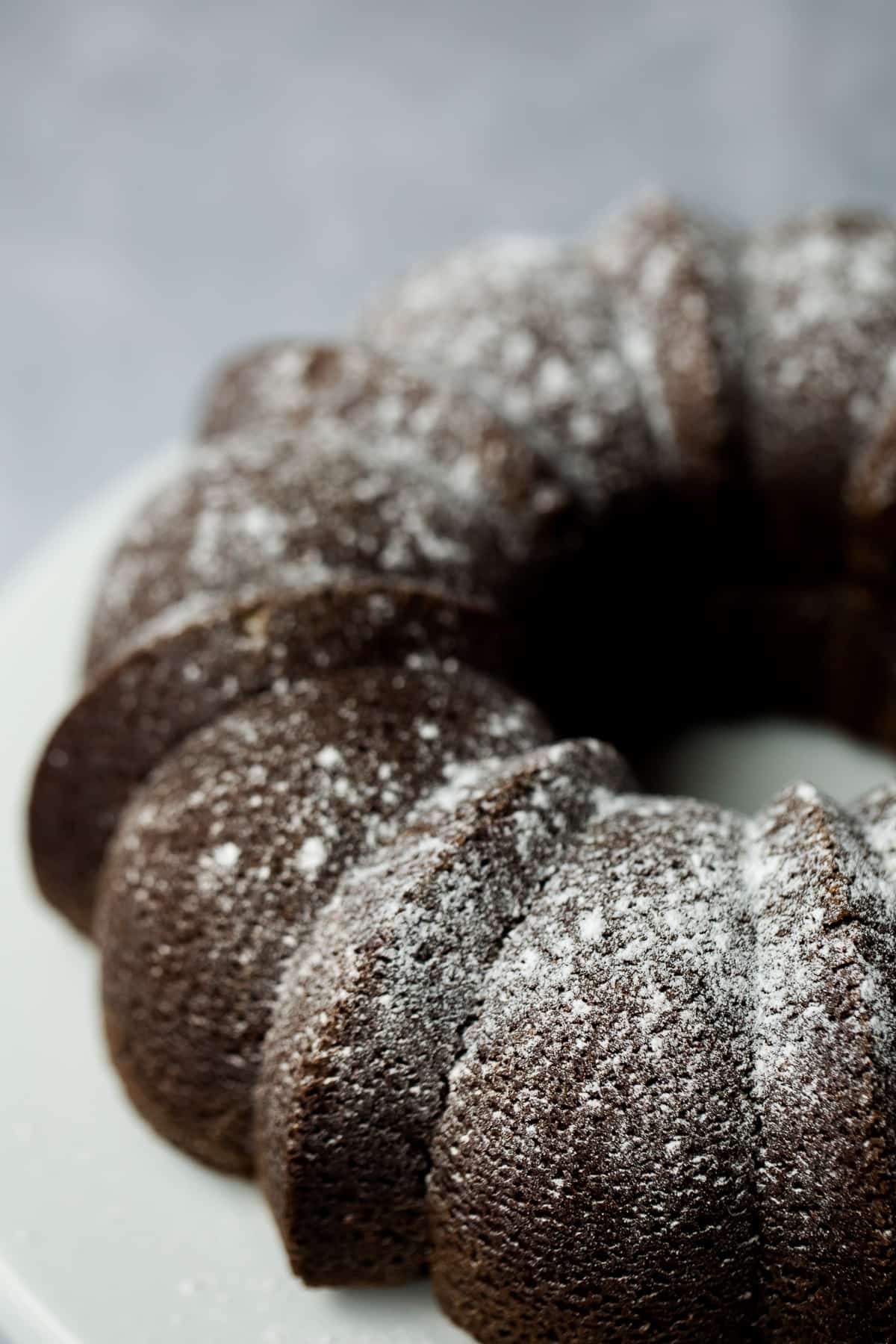 Side view of a bundt cake showing the patterns the tin has made. 