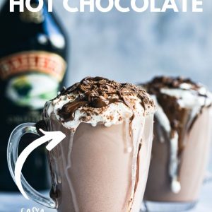 Two mugs with Baileys hot chocolate pInterest image with text overlay.