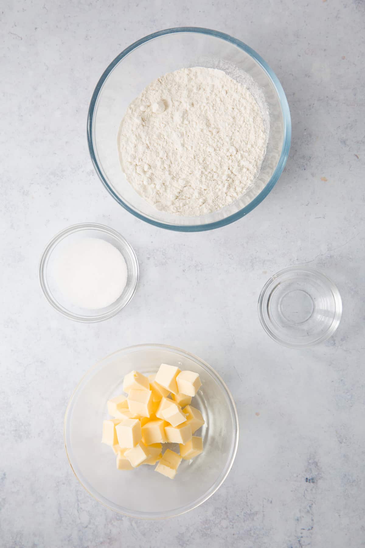 Ingredients needed for making sweet shortcrust pastry. 
