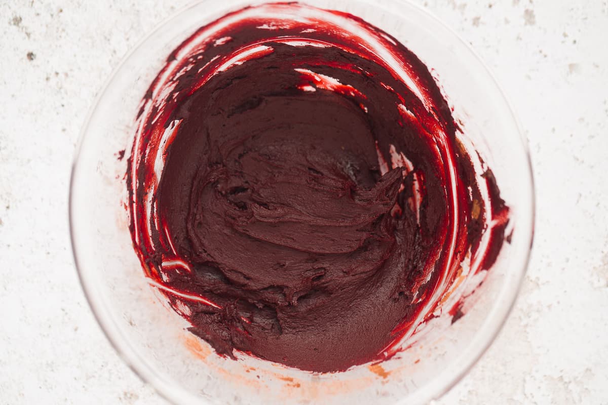 A red paste made from gel food colouring, water, cocoa powder and vanilla bean paste. 