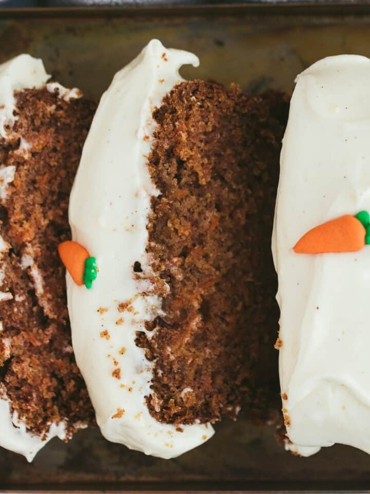 A carrot cake loaf that has been sliced.
