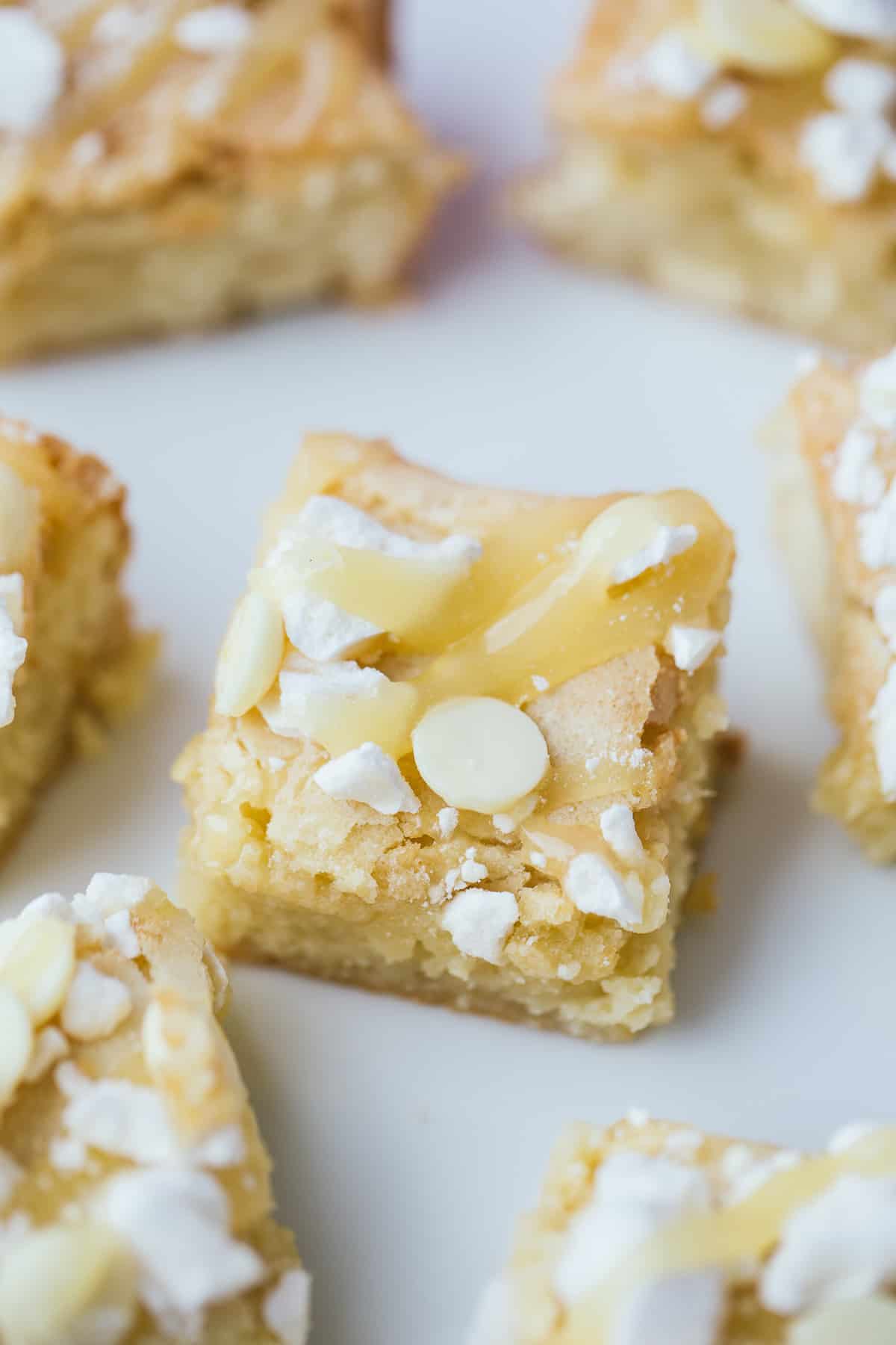 A white chocolate blondie with lemon curd and meringue. 