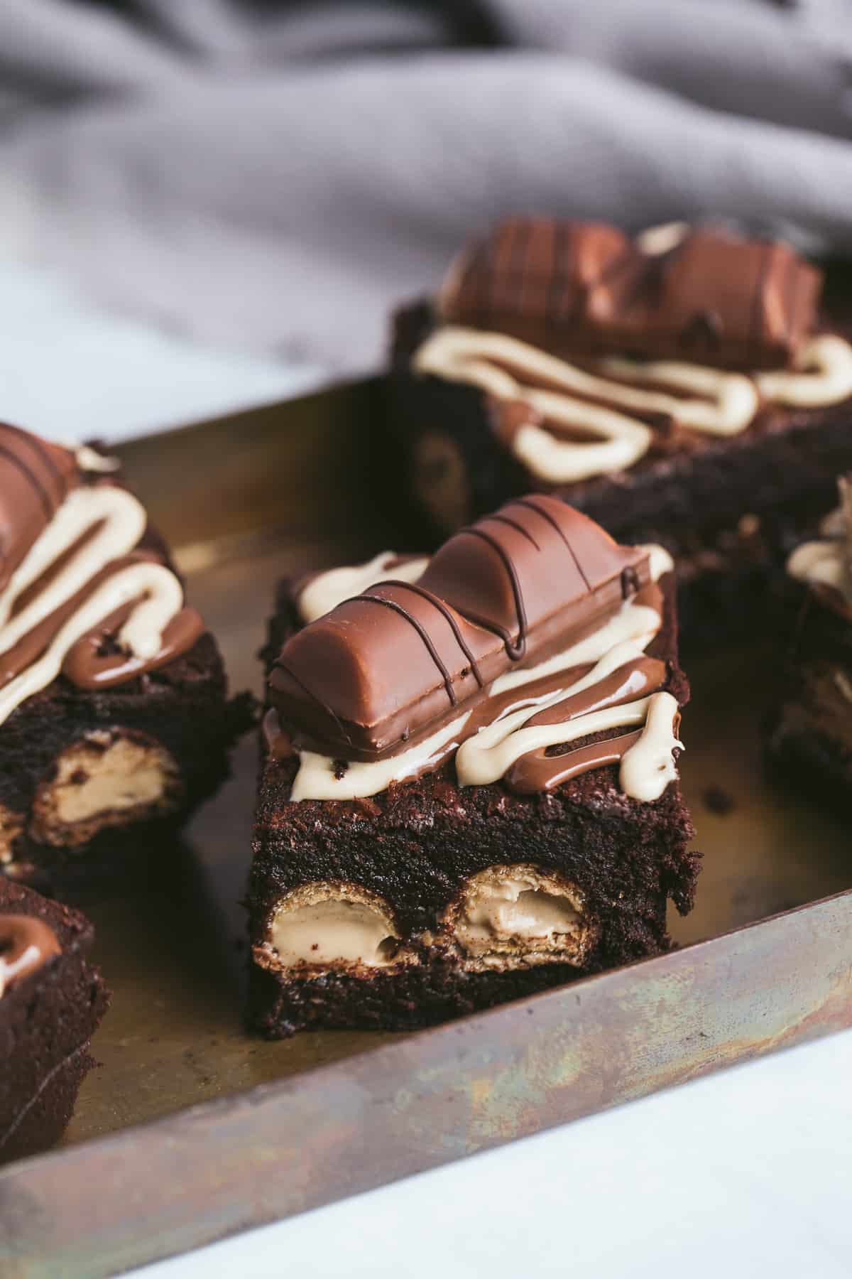 A chocolate brownie with Kinder bueno brownies inside. 