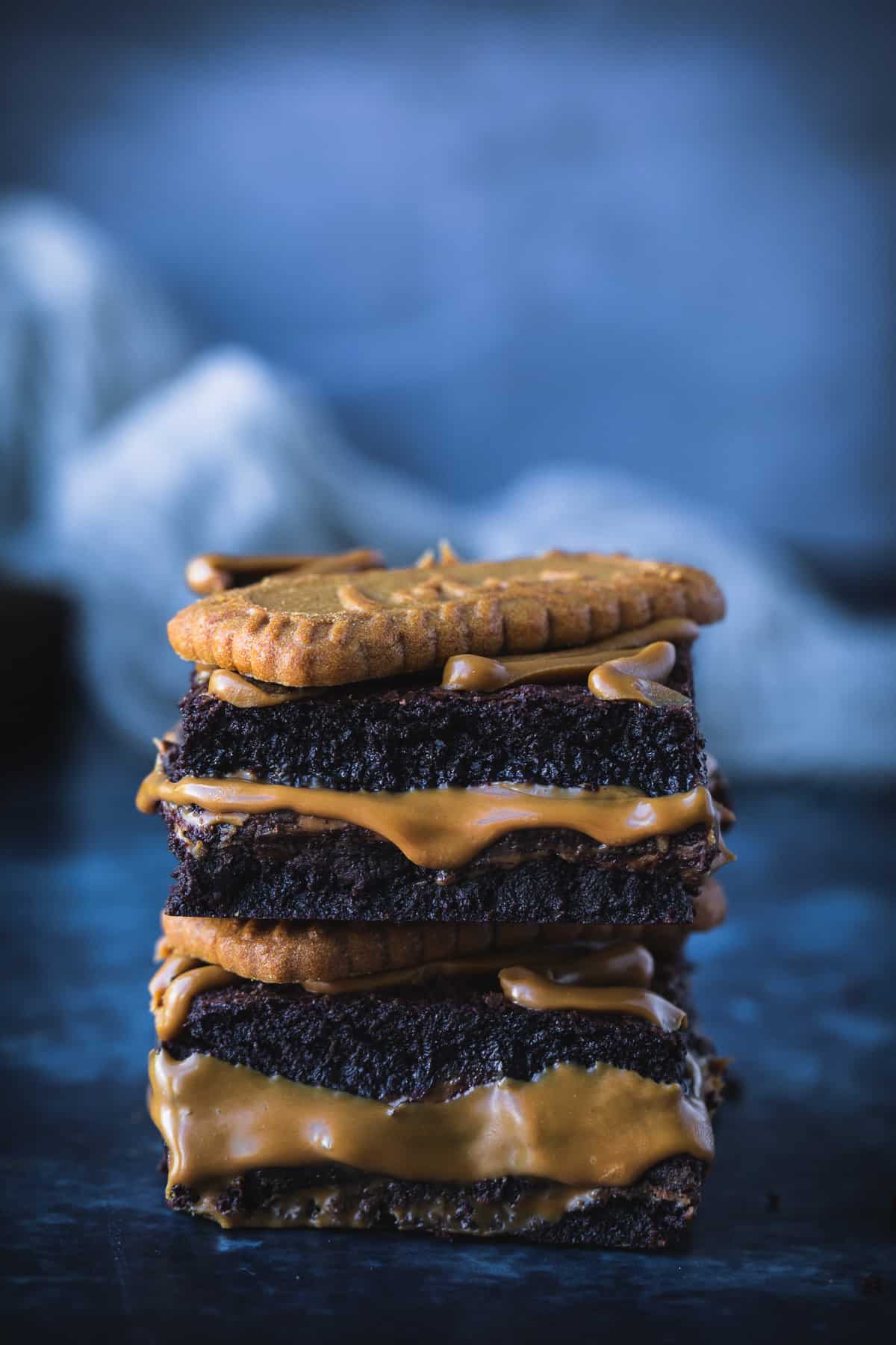 Speculoos chocolate brownies stacked on top of each other. 