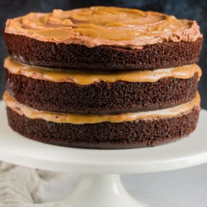 A three layer chocolate salted caramel cake.